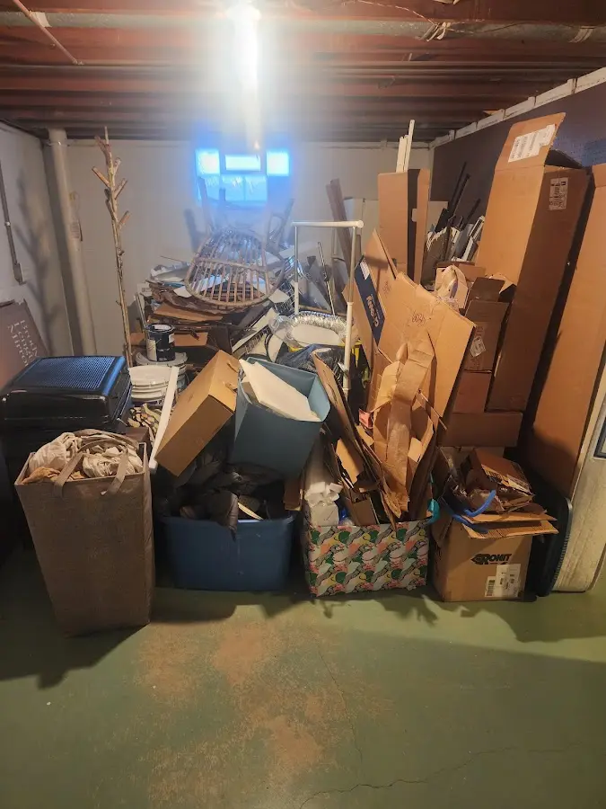 Roll-off dumpster container at job site for 15 Yard Dumpster Rental in Shapleigh